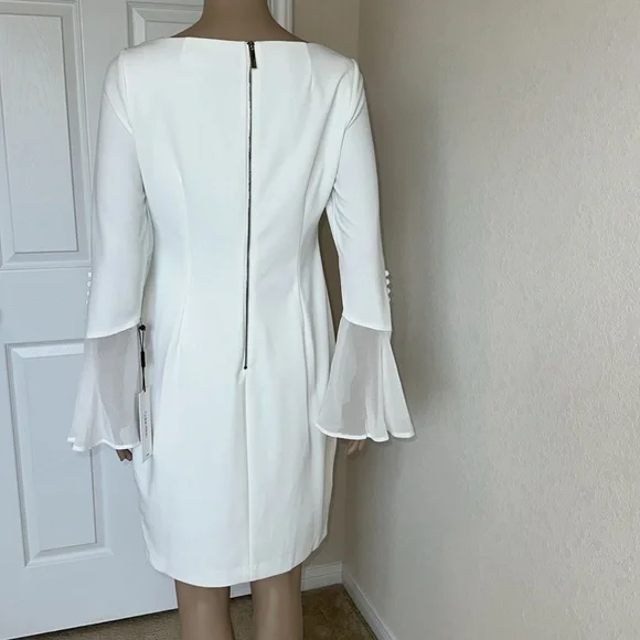 Elegant Calvin Klein White Dress with Flared Sleeves. - Picture 2 of 15